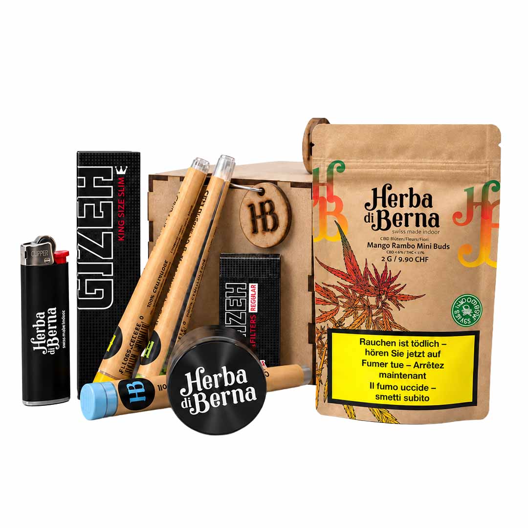 Herba di Berna Smoker Box Mango Rambo Mini-Buds Herba di Berna Smoker Box mit Mango Rambo Mini-Buds 2 g sowie Pre-Rolls, Grinder, Feuerzeug und Pressholz-Box