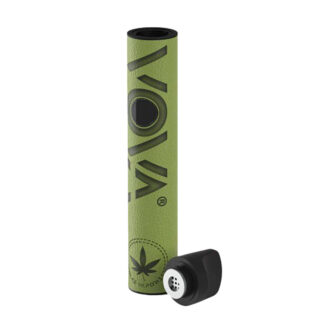 Contenu du kit de démarrage du vaporisateur en vert, montre l'appareil, la brosse et l'outil de raclage.